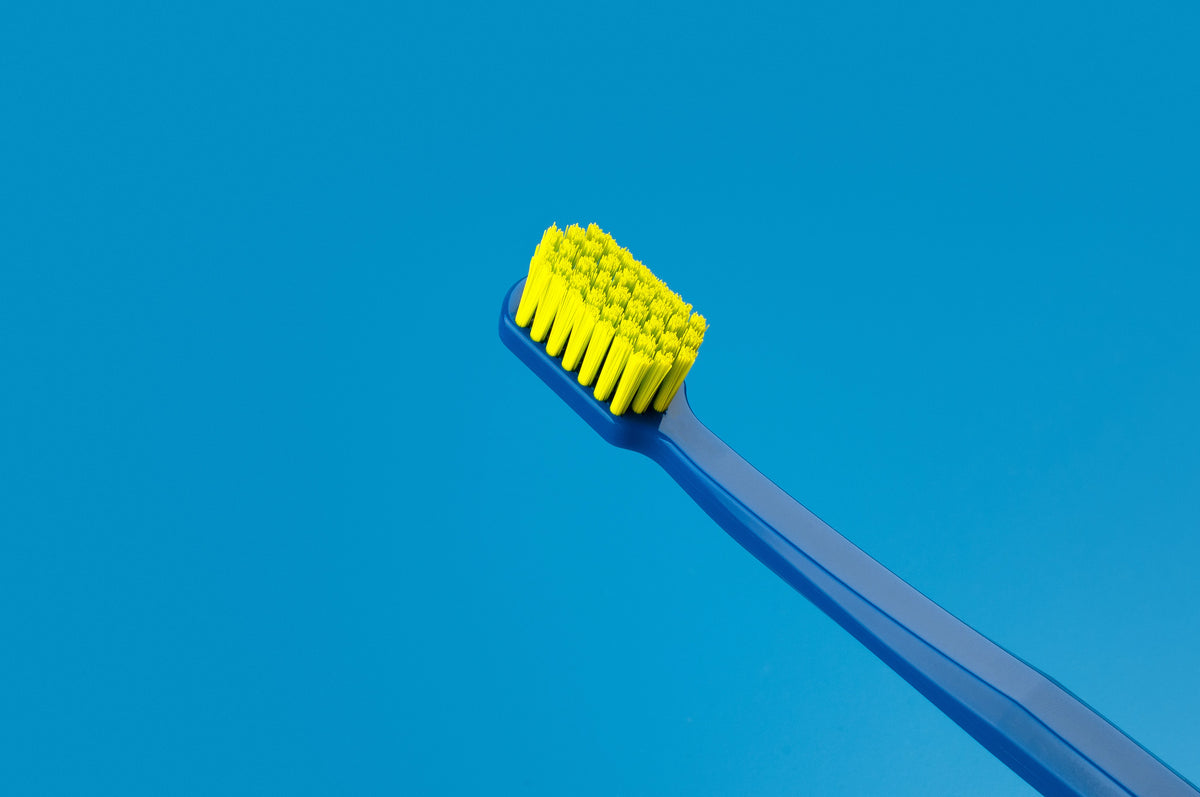 Editorial_Toothbrush_CS 1560_Navy-Lime_73327814_001